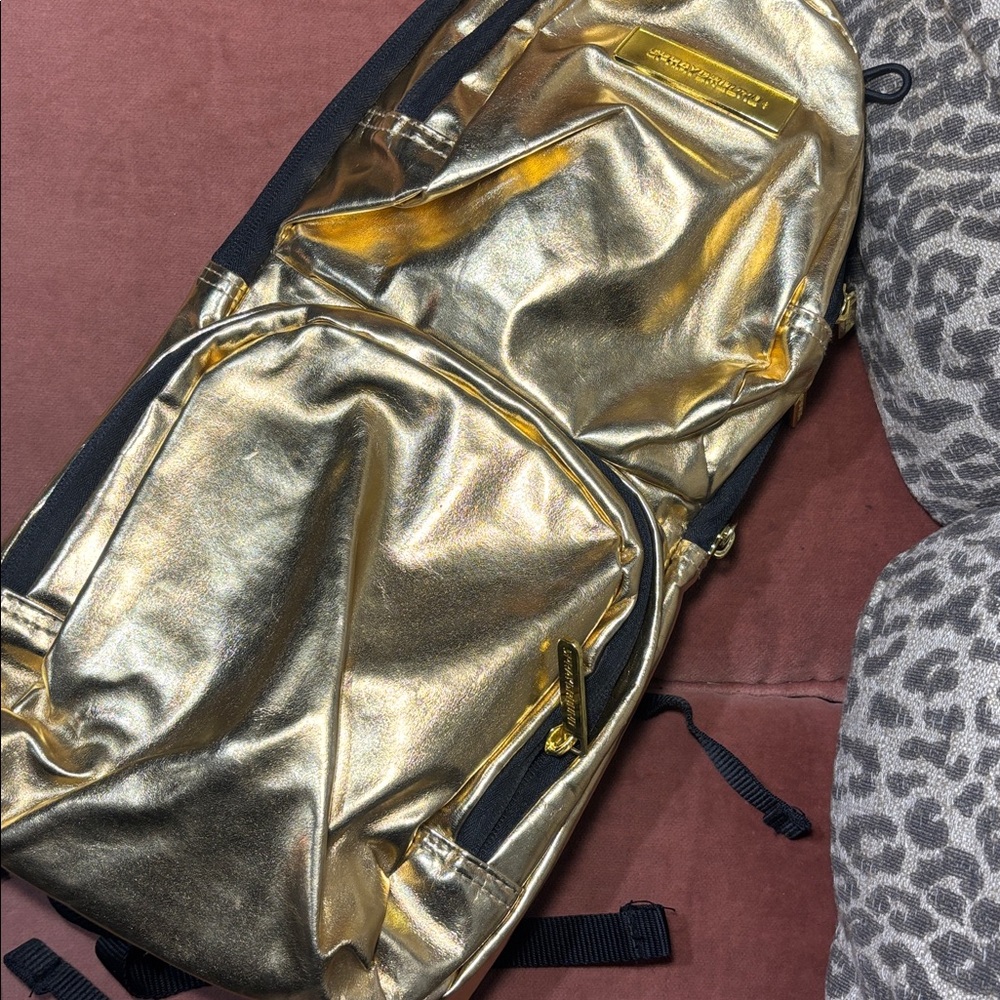 Sprayground gold metallic hydro pack maximalist camel pack hiking backpack